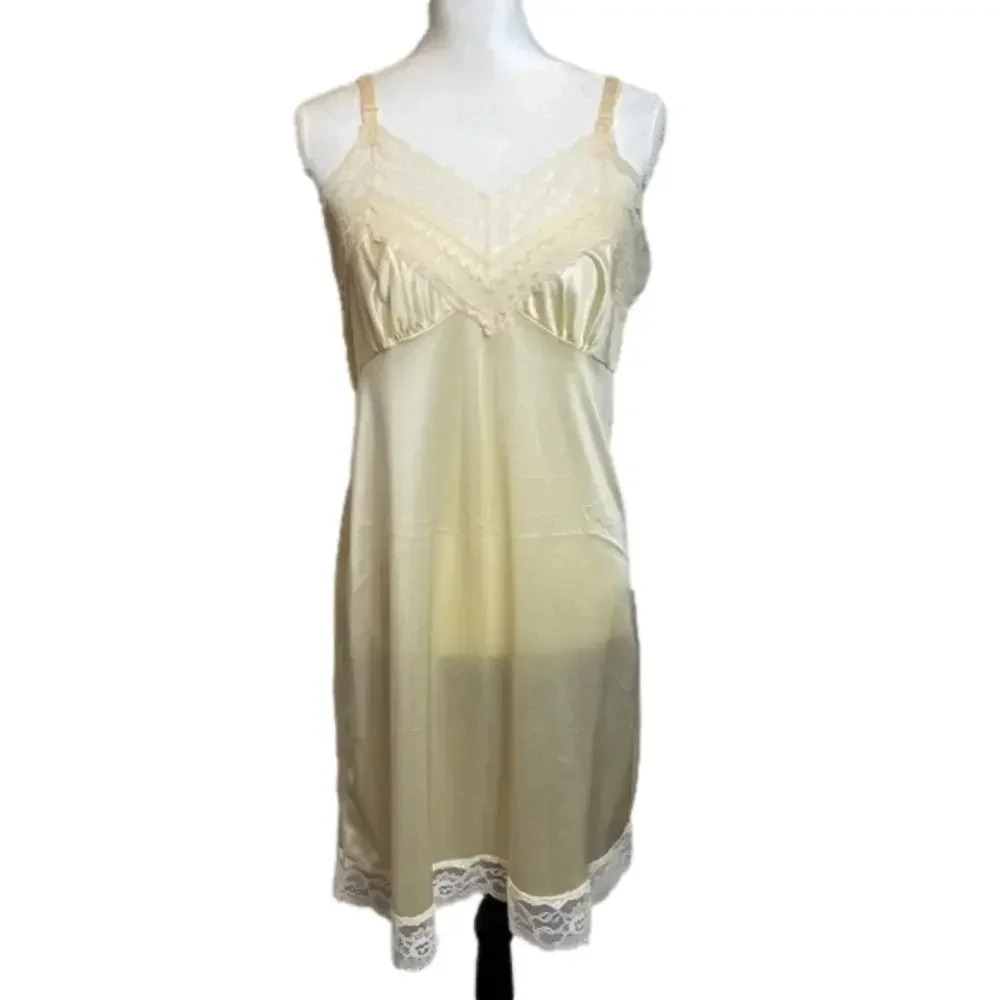 VINTAGE lingerie by‎ Vincent. Ivory color with lace trim.